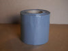 A roll of gray 6 inch berm tape 