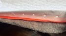 Spill Bully Berm Pad cut to show the layers of fabric