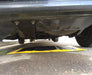 Spill Bully's Drip mat underneath a vehicle